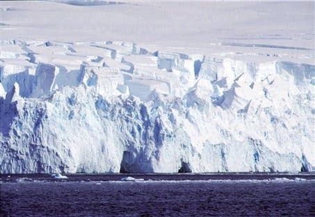 Masses of ice rise up to 120 feet above the water level near the Southern Shetlands archipelago in Antarctica during the southern hemisphere's summer season. (c) AP