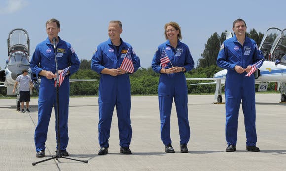 Joining Ferguson (left in photo) for the 12-day STS-135 mission to the International Space Station are pilot Doug Hurley (second left), and mission specialists Sandy Magnus and Rex Walheim. (c) NASA