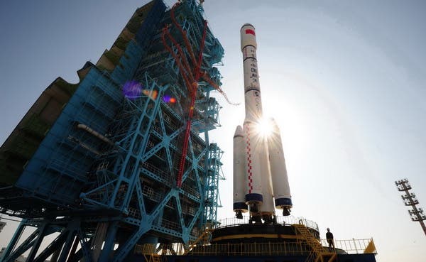 The Tiangong-1 on top of the Long March II-F rocket, prepped for launch at the Jiuquan Satellite Launch Center. (c) Shu Dong/for China Daily