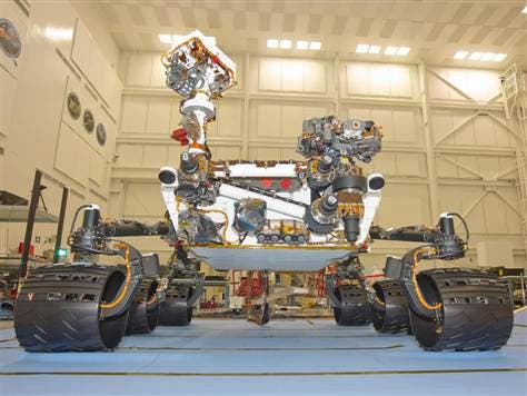 NASA's Mars Science Laboratory as seen during a final testing at the Jet Propulsion Laboratory. Curiosity is now deep in space on route to Mars. (c) NASA