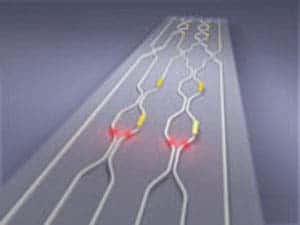 Artist's impression of the quantum photonic chip, showing the waveguide circuit (in white), and the voltage-controlled phase shifters (metal contacts on the surface).