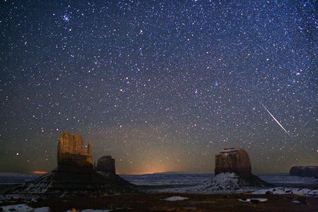 A Geminid meteor streaks over Monument Valley, Utah, in 2007. (c) Wally Pacholka, TWAN 