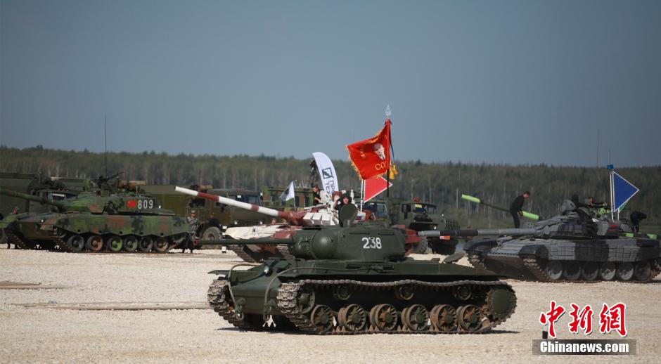 The Biathlon opening ceremony including a parade of historical Soviet armored vehicles, like this KV series heavy tank from World War II. A ZTZ-96A and T-72B can be seen in the background