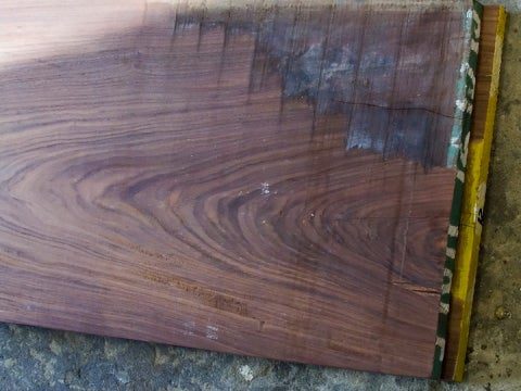 Morado wood that would become the side panels for the wheeled projector.