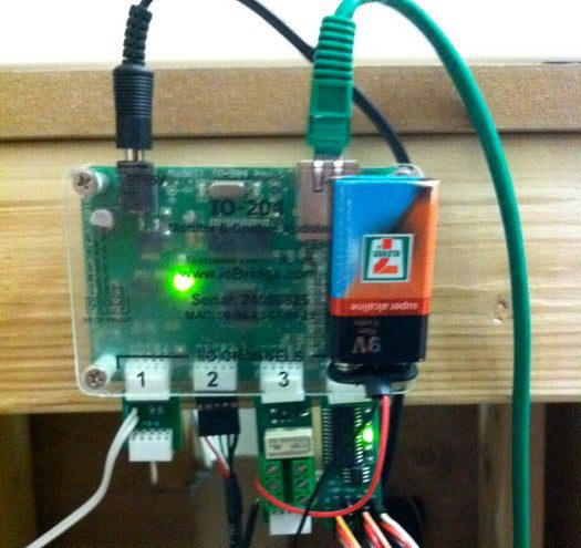 Add a servo smart board to the iobridge 204 micro controller. Add a "single servo position widget" to the iobridge dash board using the location that retains the beer on the shelf. This setting is the "up" position. Next, find a value that is 90 degrees away from the up position to release the beer and create another widget for this "down" location. You should now have two iobridge widgets on your iobridge dashboard that you can name "servo up" and "servo down" respectively. Complete this step for each servo that will be vending beer. You now have a working vending machine! But what fun is that? Let's shoot some beers. In order to create a internet controlled switch, you will need an iobridge relay board. Pick a port on the iobridge and assign a "Digital Output Pulse Widget." Assign its pulse width to 100ms . Connect the wire connecting to the positive side of the nine volt battery to the "common (C)" screw terminal on the relay. Connect the negative wire to one of the wires on the sprinkler valve. Connect the remaining wire on the sprinkler valve into the "Normally Open (NO)" screw terminal. This will create a digital switch that will open the valve for one tenth of a second when the "Fire" button is pressed releasing the compressed air and firing your beer. Hook it up exactly like I did in the picture and you can skip all the electrical jargon. <em>Editor's note: adding widgets on the iobridge dashboard is extremely easy so I did not go into detail.</em>