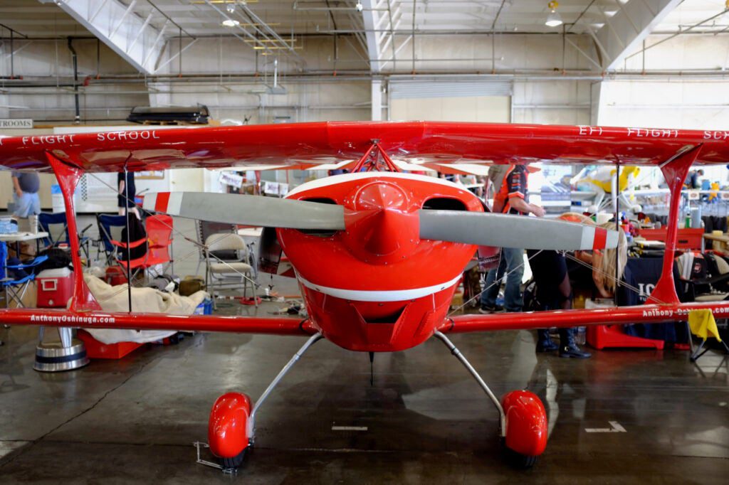 Pitts S-1S aerobatic red biplane from the front