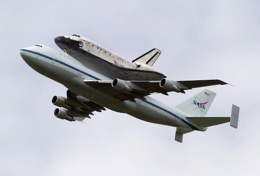 The shuttle aboard its 747 taxi, looking a little bit worse for wear. I mean, I know it's been to space, but maybe a wash?