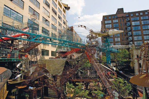 Climbable tubes made of wrought-iron netting wrap around two aircraft fuselages, a fire engine, a castle turret, three tram cars and a 25-foot-tall cupola in this adjunct to the St. Louis City Museum. Iron "slinkies" narrow and spill out onto a three-story slide. Designed by Bob Cassilly.