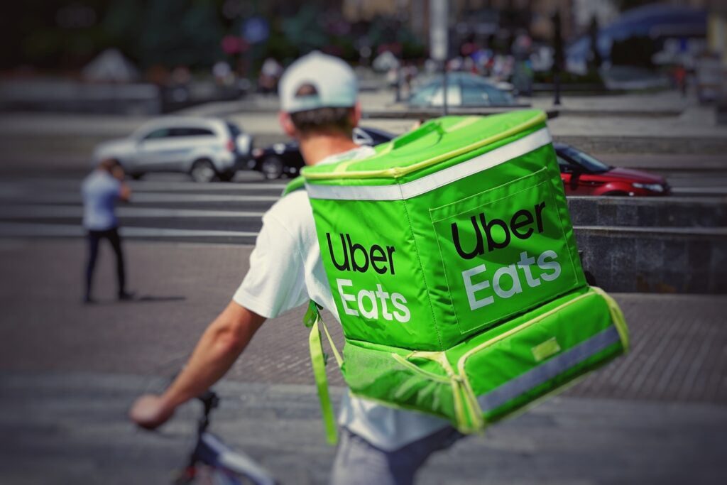 an Uber Eats delivery person on a bike