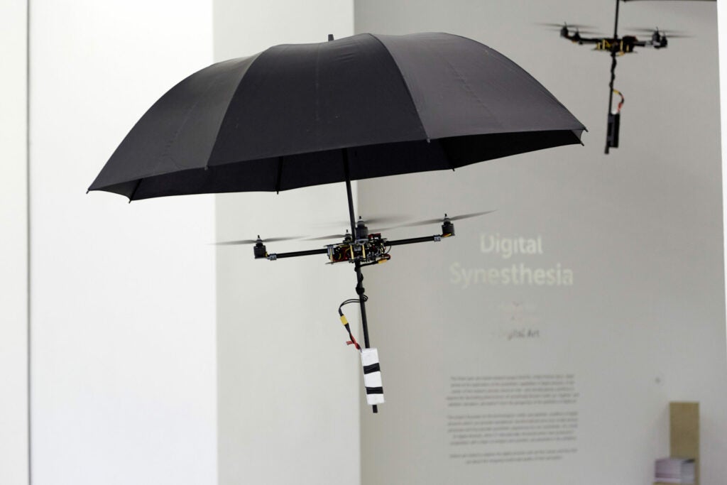 A drone made from an umbrella flies.