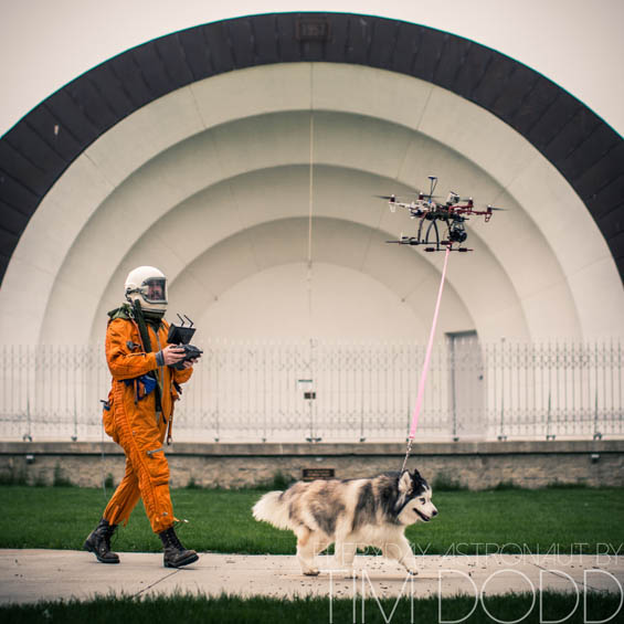 I mean, it’s obvious that an astronaut would walk their dog with a drone, while looking dapper and strutting down the street in their space suit.