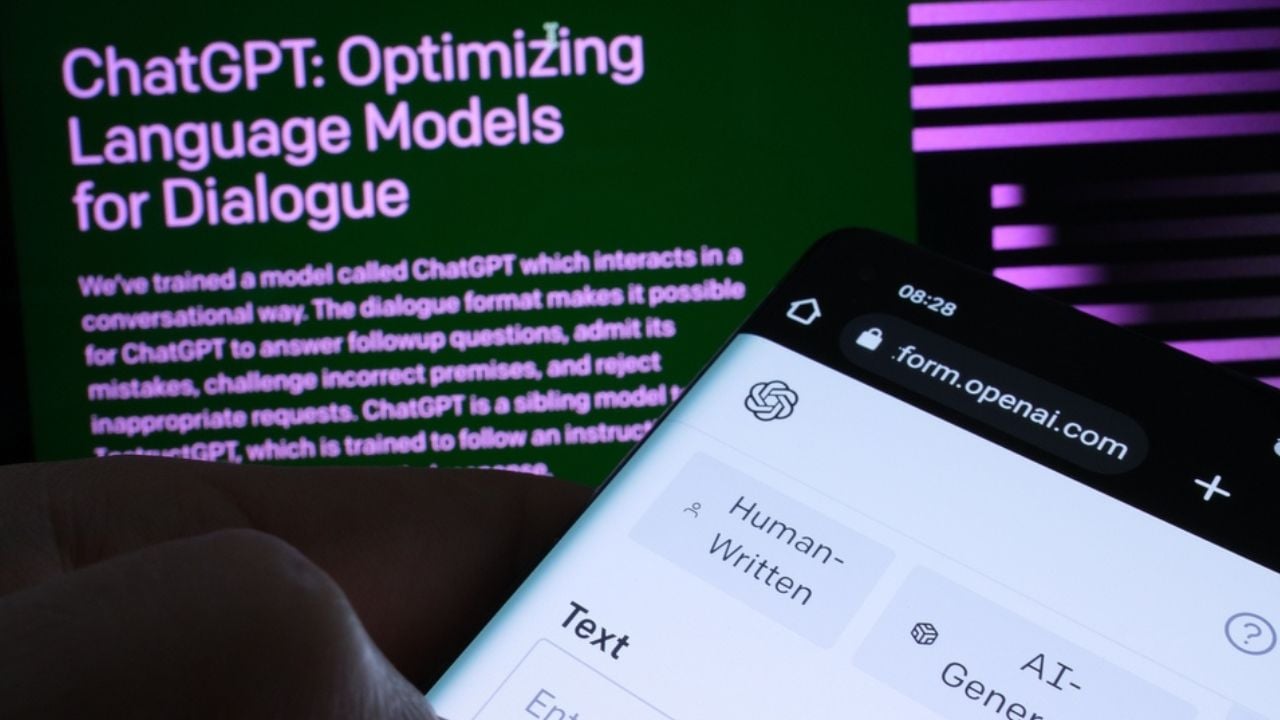 Ai Text Classifier software webpage seen on smartphone screen and ChatGPT page on the blurred background. Tool for AI written text detection by OPEN AI. Stafford, United Kingdom, February 2, 2023