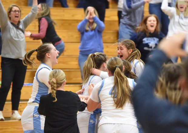 North Penn players celebrate after Caleigh Sperling, 4, shot in overtime beat the buzzer to give the Knights a 56-54 victory over North Allegheny in the PIAA-6A second round on Tuesday, March 12, 2024 at Bald Eagle Area High School. (Mike Cabrey/MediaNews Group)