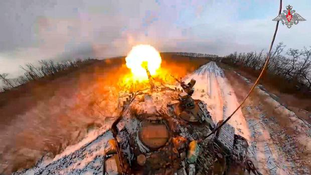 FILE - In this photo taken from video and released by the Russian Defense Ministry Press Service on Thursday, Feb. 8, 2024, a Russian tank fires in an undisclosed location in Ukraine. Russian President Vladimir Putin has focused his reelection campaign in the March 15-17 balloting on a pledge to fulfill his goals in Ukraine, describing the conflict as a battle against the West for Russia's very survival. (Russian Defense Ministry Press Service via AP, File)