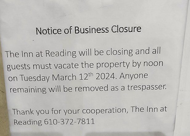 A notice posted at the lobby of the Inn at Reading asks guests to vacate the property by March 12. (Keith Dmochowski - MediaNews Group)