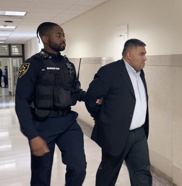 Andres Marin is escorted by a deputy sheriff from a Montgomery County courtroom on March 13, 2024, to begin serving jail term for involuntary manslaughter in a 7-year-old child's death. (Photo by Carl Hessler Jr. - MediaNews Group)