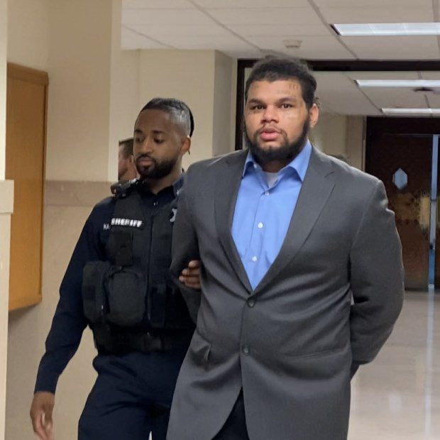 Cody Kavon Reed, 24, is escorted by a deputy sheriff from a Montgomery County courtroom on Feb. 26, 2024, during a break at his homicide trial. (Photo by Carl Hessler Jr. - MediaNews Group)