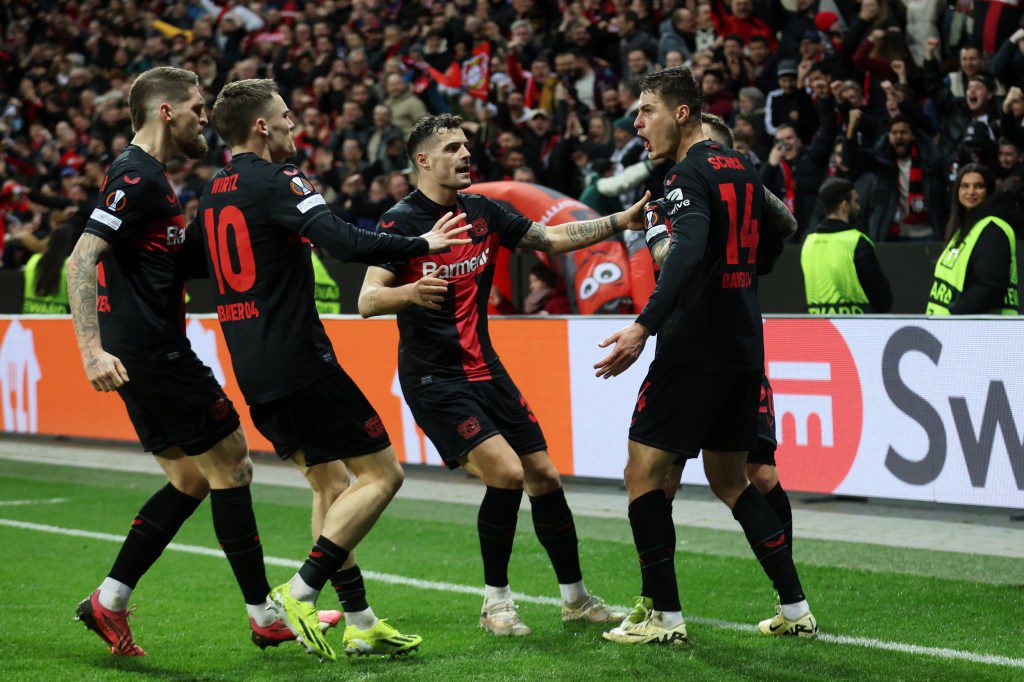 Patrik Schick of Bayer Leverkusen celebrates scoring his team's second goal with teammates during the UEFA Europa League 2023/24 round of 16 second leg match between Bayer 04 Leverkusen and Qarabag FK at BayArena