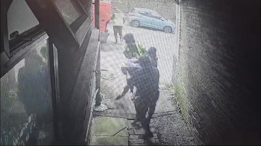 Video grab from footage of a man being being dragged into a van on Westcroft Rd, Bradford at 11.10am on Wednesday 6 2024. Photo released March 14 2024. CCTV footage has caught the terrifying moment a man in Bradford was apparently kidnapped in broad daylight.The footage, taken on March 6, on Westcroft Rd, Bradford at 11.10am on Wednesday 6, shows a red van pulling up outside a house before three men get out and head down and alleyway.Moments later, the three are scene dragging a man into the van as he tries desperately to escape before they make off.