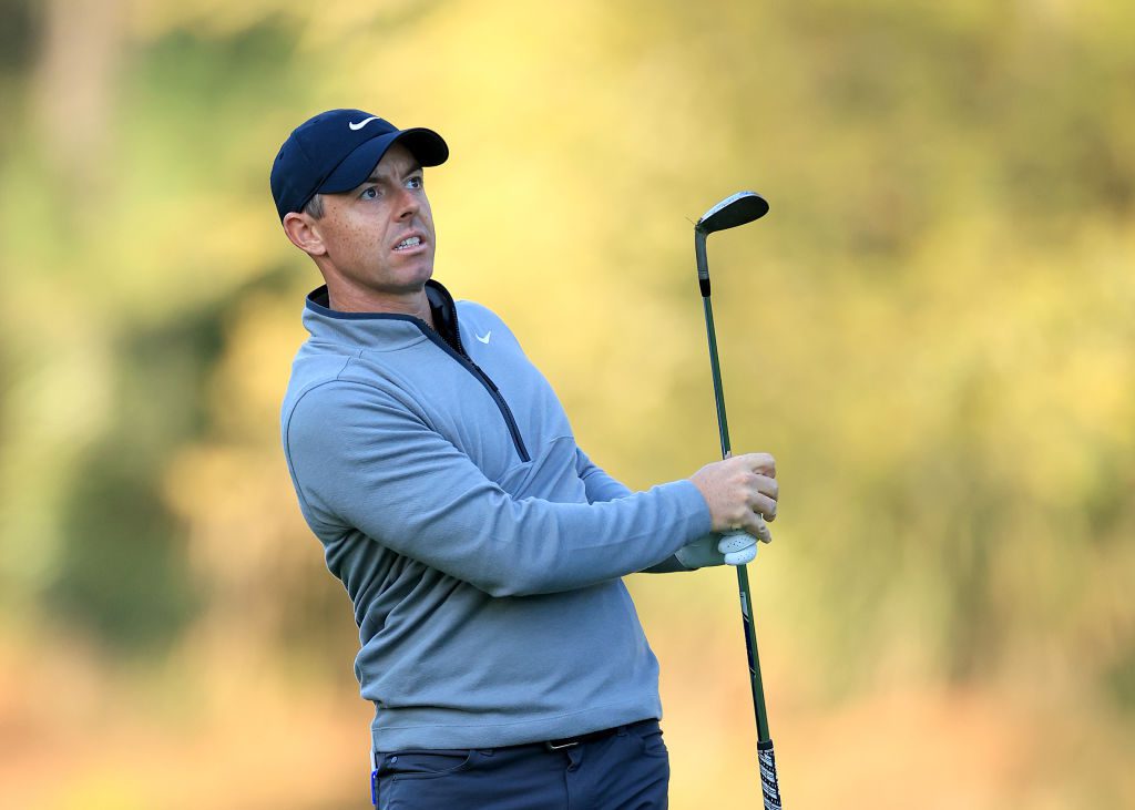 Rory McIlroy of Northern Ireland plays his second shot on the 10th hole during the first round of THE PLAYERS Championship on the Stadium Course at TPC Sawgrass on March 14, 2024.