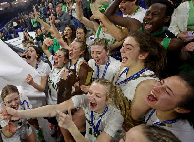 Bishop Feehan celebrates after capturing the Div. 1 girls basketball state title thanks to a 48-40 win over Wachusett Regional in Lowell. (Staff Photo/Stuart Cahill/Boston Herald)