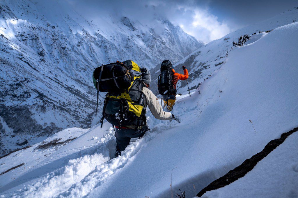 Mount Everest Base Camp Trek. After two meters of new snow 2 ski climbers; Shutterstock ID 2273732193; purchase_order: -; job: -; client: -; other: -