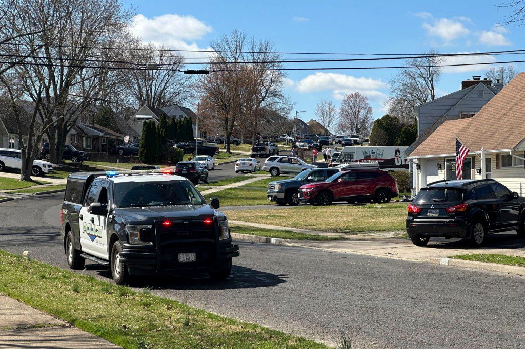 Police patrol a neighborhood after a shooting on Saturday, March 16, 2024 in Levittown, Pa. Several people have been shot after gunfire erupted in a suburban Philadelphia township, prompting authorities to warn residents to hunker down in their homes and forcing cancellation of a St. Patrick???s Day parade and a children???s theme park. (AP Photo/Michael Catalini)