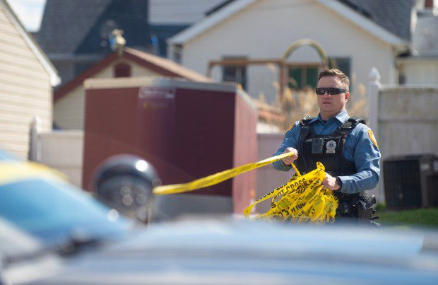 Police officers from the Falls Township Police Department tape off and inspect the scene of a shooting in the Vermillion Hills neighborhood March 16, 2024, in the Levittown section of the township. Andre Gordon shot and killed three people before fleeing to Trenton, police said. (Matthew Hatcher/Getty Images)