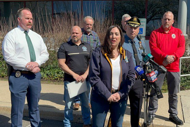 Bucks County District Attorney Jennifer Schorn and Falls Township Police Chief Nelson Whitney give details about the fatal shooting of three people in the Levittown section of the township Saturday, March 16, 2024. Schorn said Andre Gordon fatally shot his stepmother, sister and the mother of his two children at two separate locations before fleeing for Trenton. (Mike Catalini/AP)