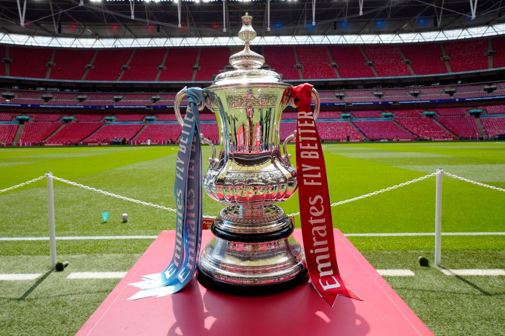 FILE - The FA Cup trophy is seen before the English FA Cup final soccer match between Manchester City and Manchester United at Wembley Stadium in London, Saturday, June 3, 2023. Barnsley was expelled from this season???s FA Cup on Wednesday after it fielded an ineligible player in professional soccer???s oldest knockout competition. The English division three team said an ???administrative error??? was to blame for fielding the unnamed player in its first round replay against Horsham. (AP Photo/Jon Super, File)