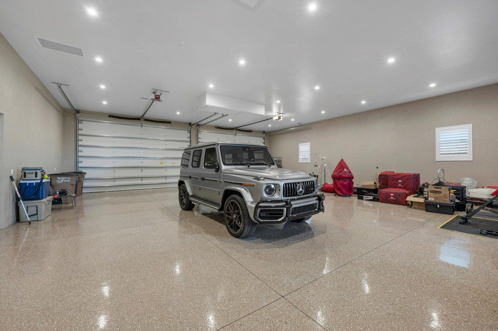 Story from Jam Press (Gun Room Mansion) Pictured: The garage. Mansion with fortified SAFE ROOM full of guns hits market for $4.5M A mansion with a fortified safe room full of guns and cameras has gone on the market for $4.5 million. The secure room has ball bearings cast in solid poured concrete and an advanced security system with 32 cameras for ???peace of mind???. The sprawling home is in Fort Myers, Florida, and boasts four bedrooms and six bathrooms spread out across 5,700 sq ft. As well as the panic room, the mansion has a host of luxury features. Highlights include a 12-car garage, a stunning swimming pool, and a luxury South African Braai barbequing room equipped with specialist equipment. But the showstopper, perhaps, is a home cinema worth over $1 million ??? which is professionally certified and includes an impressive sound system and bison leather seating for an ???unmatched cinematic experience???. Throughout the home are luxe touches, including white pearl Cristallo Quartzite countertops and Thermador appliances grounded by the Legno and Bastone White Oak floors. Bowers & Wilkens surround sound is installed throughout, as are multiple 100-inch television sets, and a Savant smart home system. The listing reads: ???The estate is a marvel of design, where sheer elegance meets functionality, with a touch of excess. ???Welcome to your sanctuary of unparalleled sophistication and comfort, it???s time to live life to the fullest and make memories in this unparalleled home.??? The property ??? which features on What's The Jam ??? is currently on the market with the Aaron Wolf Group at John R Wood Christie???s International. ENDS EDITOR???S NOTE: Video Usage Licence: (PROFESSIONAL PARTNER) We have obtained this material from a professional partner for use by our news media clients (company press release / other media agency). Video Restrictions: None.