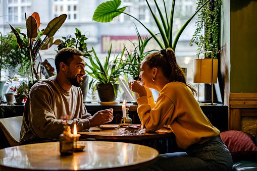 Couple on a weekend date at cute cafe