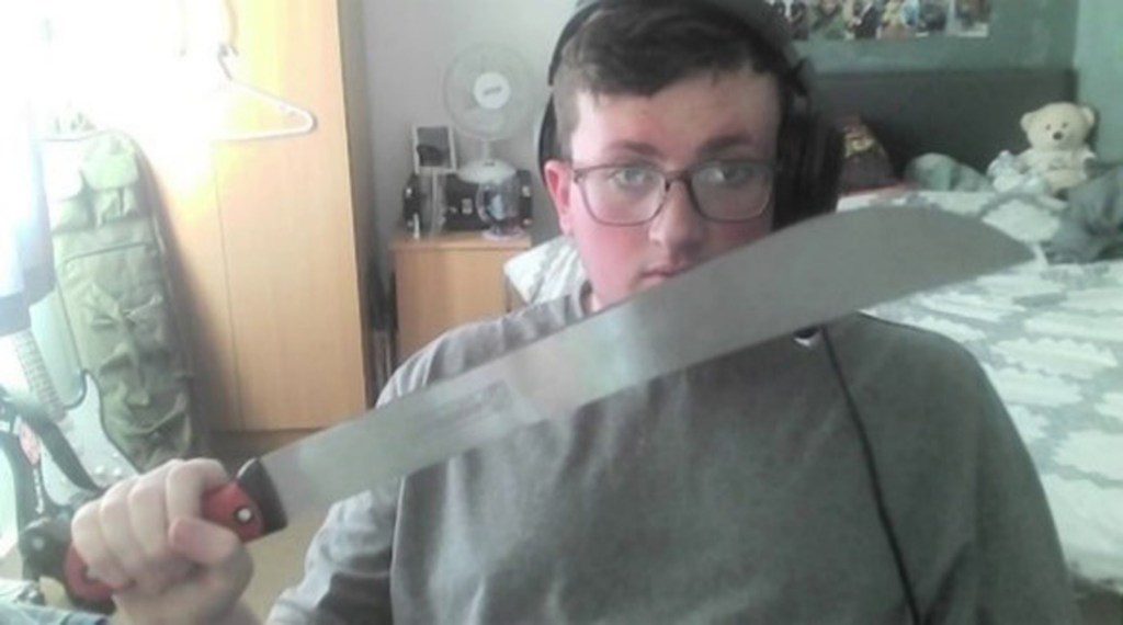 Undated handout photo issued by Greater Manchester Police of Jacob Graham with a machete, he has been found guilty terror offences. Issue date: Friday February 23, 2024. PA Photo. Jacob Graham, 19, whose 