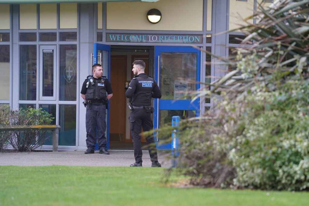 BGUK_2872889 - Hartlepool, UNITED KINGDOM - **Strictly No Daily Mail Online usage via BackGrid** St Hild???s School in Hartlepool, UK on lockdown by Armed officers after an incident - Armed police on scene and student only just being released from school. Armed officers with guns are on scene as students are slowly being released from the school. Worried parents are pictured waiting for their children at the gates. The school finished at 3pm and students are only being released. Pictured: GV: School Hartlepool BACKGRID UK 18 MARCH 2024 BYLINE MUST READ: TERRY BLACKBURN / BACKGRID UK: +44 208 344 2007 / uksales@backgrid.com USA: +1 310 798 9111 / usasales@backgrid.com *Pictures Containing Children Please Pixelate Face Prior To Publication*