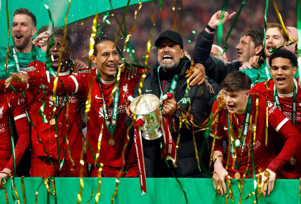 Virgil van Dijk of Liverpool and Jurgen Klopp, Manager of Liverpool celebrate with trophy after winning the Carabao Cup Final  after the match between Chelsea and Liverpool at Wembley Stadium.