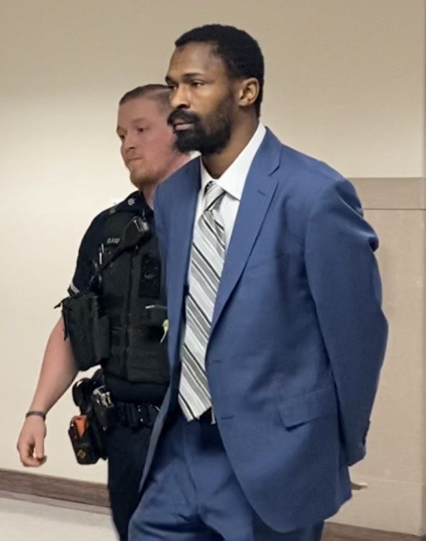 Zakkee Alhakim is escorted by a deputy sheriff from a Montgomery County courtroom on March 18, 2024, during a break at his homicide trial. (Photo by Carl Hessler Jr. - MediaNews Group)