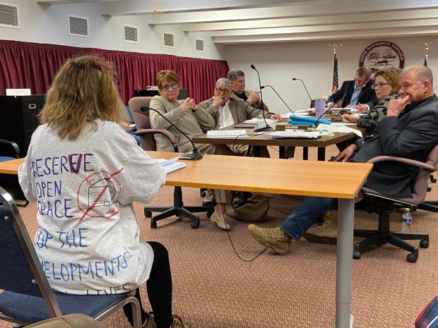 In addition to lawn signs placed around Upper Pottsgrove, some residents are bringing their message of protest about the township's attitude toward open space to the meetings right on their clothing so it won't be missed. (Evan Brandt -- MediaNews Group)