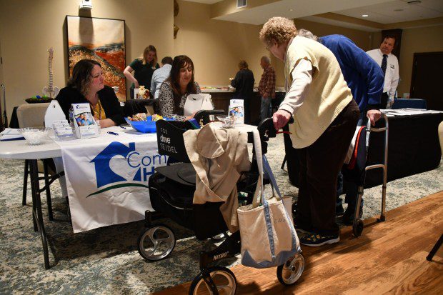 Residents talk to Comforting Home Care representatives. (Courtesy of Phoebe Berks)