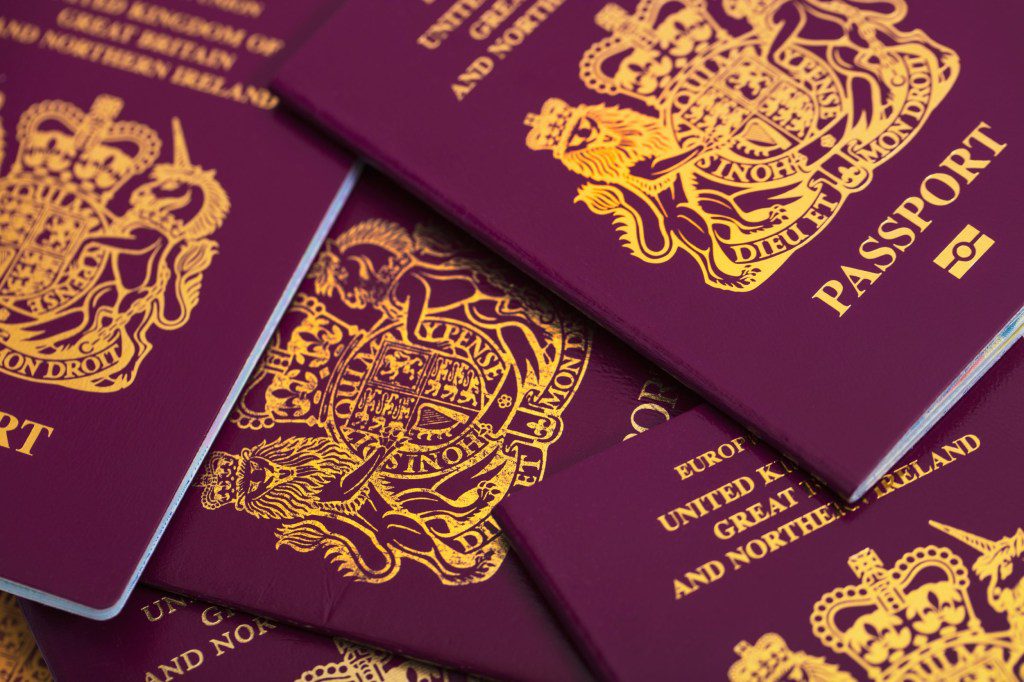 A pile of red British passports