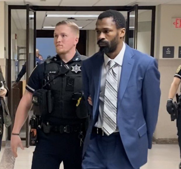 Zakkee Alhakim is escorted by a deputy sheriff from a Montgomery County courtroom on March 18, 2024 during a break at his homicide trial. (Photo by Carl Hessler Jr. - MediaNews Group)