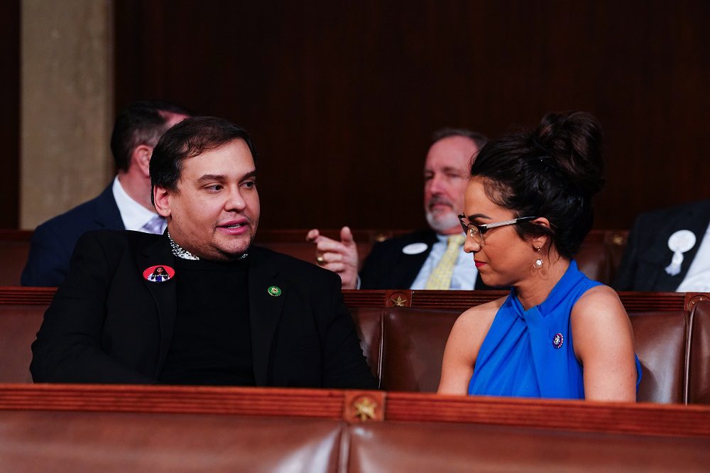 Mar 7, 2024; Washington, DC, USA; Former Republican Representative from New York George Santos (L) chats with Republican Representative from Colorado Lauren Boebert (R) ahead of US President Joe Biden’s third State of the Union address