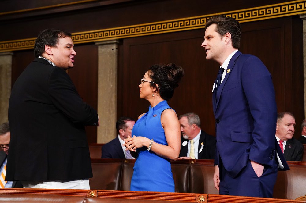 Mar 7, 2024; Washington, DC, USA; Former Republican Representative from New York George Santos (L) chats with Republican Representative from Colorado Lauren Boebert (C) and Republican Representative from Florida Matt Gaetz (R)