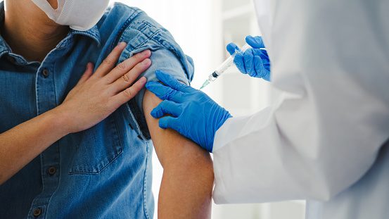 Man receiving an injection