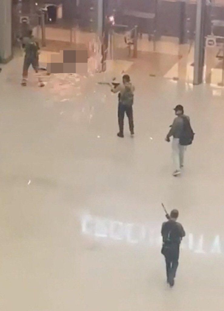 CCTV still show gunmen open fire at Crocus City Hall, in Krasnogorsk, Moscow region, Russia. 