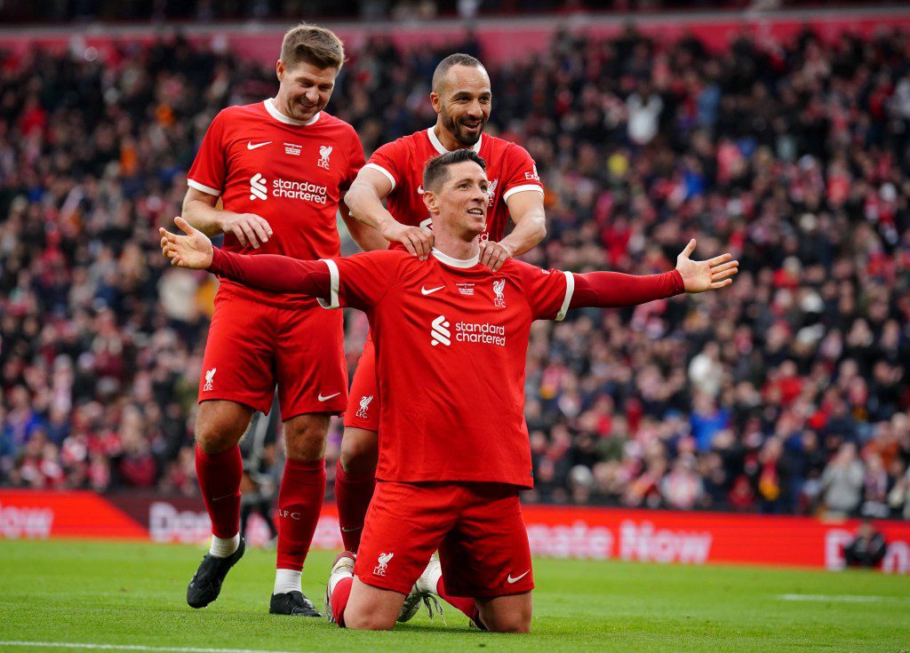 Liverpool Legends' Fernando Torres celebrates scoring his sides fourth goal with Nabil El Zhar and Steven Gerrard during the LFC Foundation's Official Legends Charity match at Anfield, Liverpool. Picture date: Saturday March 23, 2024. PA Photo. See PA story SOCCER Eriksson. Photo credit should read: Peter Byrne/PA Wire. RESTRICTIONS: Use subject to restrictions. Editorial use only, no commercial use without prior consent from rights holder.