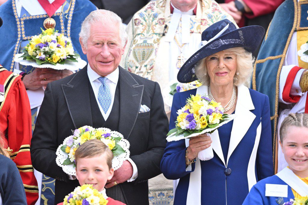 WINDSOR, ENGLAND - APRIL 14: Camilla, Duchess of Cornwall and Prince Charles, Prince of Wales hold nosegays as they attend the Royal Maundy Service at St George's Chapel on April 14, 2022 in Windsor, England. The Prince of Wales and The Duchess of Cornwall will represent The Queen at the Royal Maundy Service. (Photo by Samir Hussein/WireImage)