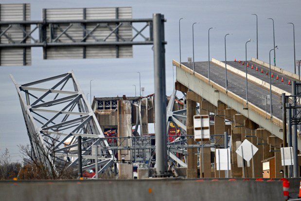 Baltimore's Francis Scott Key Bridge collapsed early Tuesday morning after a support column was struck by a vessel. (Jerry Jackson/Staff)