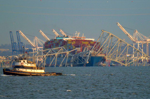 Baltimore's Francis Scott Key Bridge collapsed early Tuesday morning after a support column was struck by a vessel. (Karl Merton Ferron/Staff)