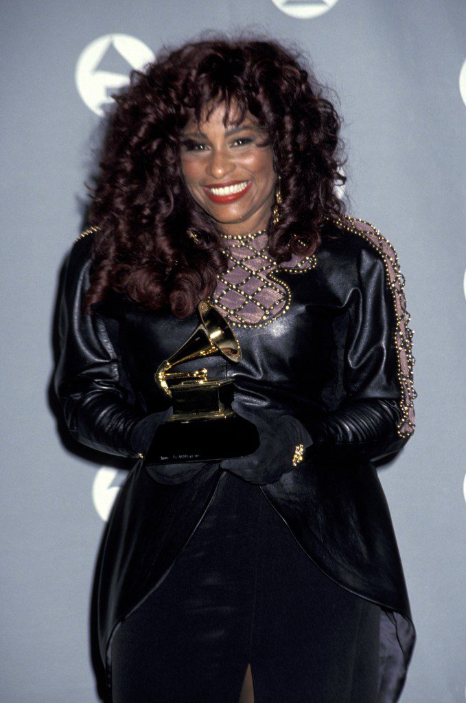 Chaka Khan holding a Grammy award.