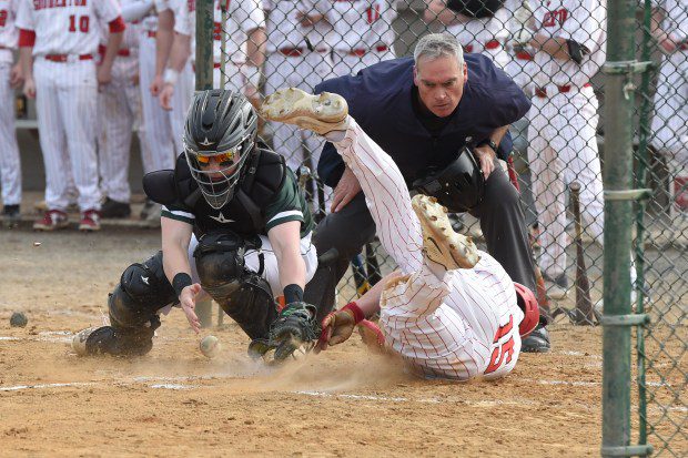 Souderton's Joey Nase, 15, is safe sliding headfirst into home plate to score a run in the bottom of the second inning against Pennridge during their game on Tuesday, March 26, 2024. (Mike Cabrey/MediaNews Group)